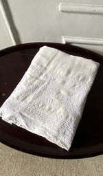 The folded set, kurta on top
