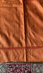 Hand embroidery on burnt orange eri silk