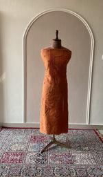 Burnt orange eri silk kurta fabric on the mannequin