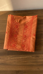 Folded tangerine orange eri silk kurta fabric, second view