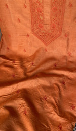Stitch detail on the tangerine orange eri silk kurta