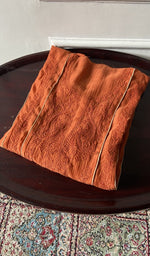Load image into Gallery viewer, the fabric folded on the stool