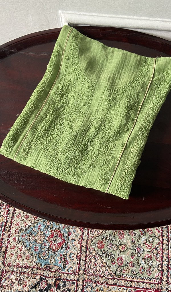 the fabric folded on the stool