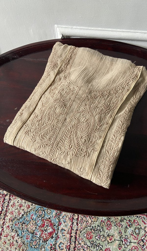 the fabric folded on the stool