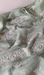 Hem and border of the green dupatta