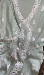 Sleeve work on green pure mul chanderi