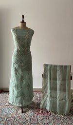The set on the mannequin with its dupatta beside it