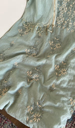 Close look at the fine contrast chikankari