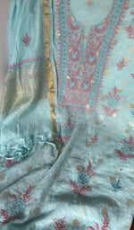 Motifs across the body of the blue kurta