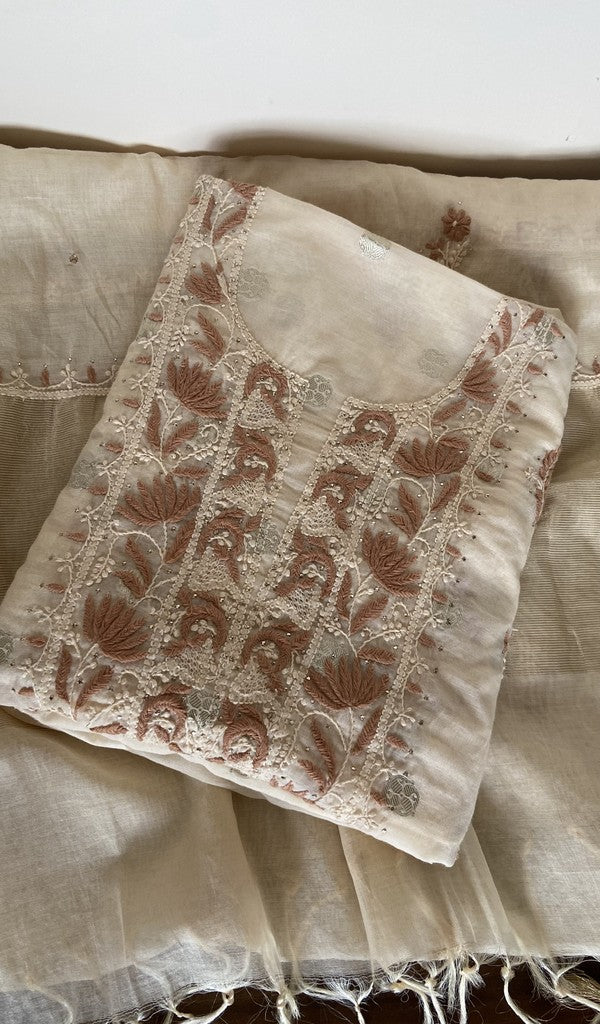 Beige pure mul chanderi kurta piece folded, fine contrast chikankari
