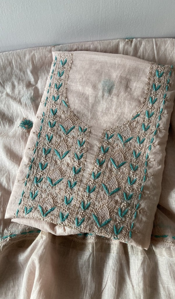 Peach pure mul chanderi kurta piece folded, fine contrast chikankari