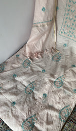 Close look at the fine contrast chikankari
