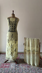 The set on the mannequin with its dupatta beside it