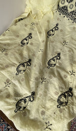 Close look at the fine contrast chikankari