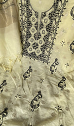 Motifs across the body of the yellow kurta