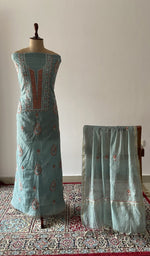 The set on the mannequin with its dupatta beside it