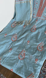 Close look at the fine contrast chikankari