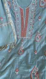 Motifs across the body of the grey kurta
