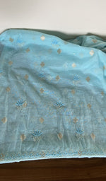Kurta and dupatta laid out together