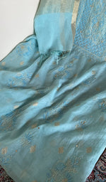 Close look at the fine contrast chikankari