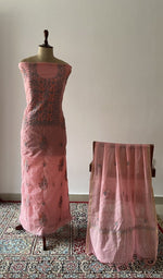 The set on the mannequin with its dupatta beside it