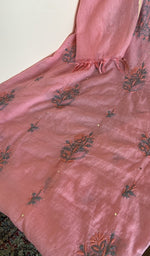 Close look at the fine contrast chikankari