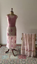The set on the mannequin with its dupatta beside it