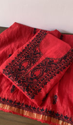 Red pure mul chanderi kurta piece folded, fine contrast chikankari