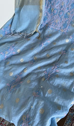 Close look at the fine contrast chikankari