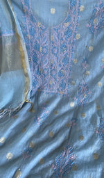 Motifs across the body of the blue kurta