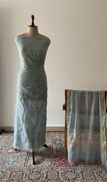 The set on the mannequin with its dupatta beside it