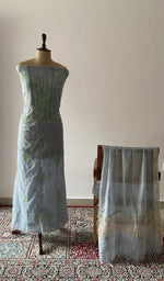 The set on the mannequin with its dupatta beside it