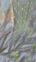 Motifs across the body of the grey kurta