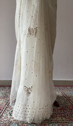 Badla work with allover butterfly motifs across the pallu