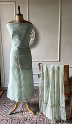 Aqua mul chanderi chikankari 3 pc unstitched suit set laid out