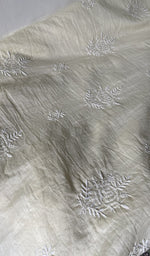 Chikankari across the body of the ivory kurta piece
