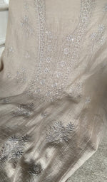 fine chikankari with beads cutdana and sequins on neck across the body of the kurta