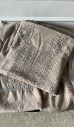 The folded set, kurta on top