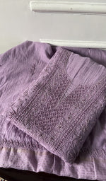 Load image into Gallery viewer, lilac chikankari set folded, worked panel on top