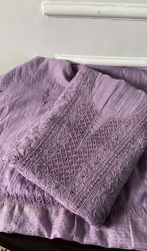 lilac chikankari set folded, worked panel on top