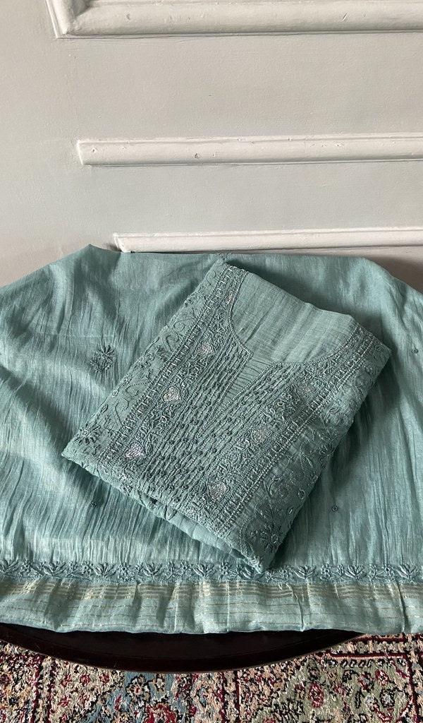 powder blue pure mul chanderi chikankari 3 pc unstitched suit set, folded