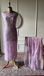 将图像加载到图库查看器中， Lilac mul chanderi chikankari 3 pc unstitched suit set laid out