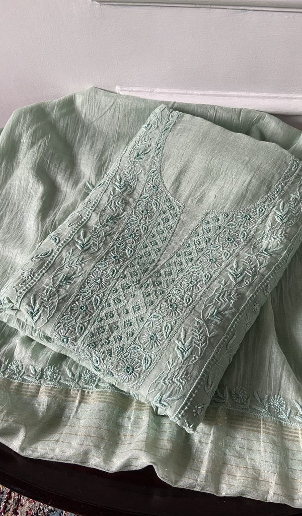 mint green chikankari set folded, worked panel on top