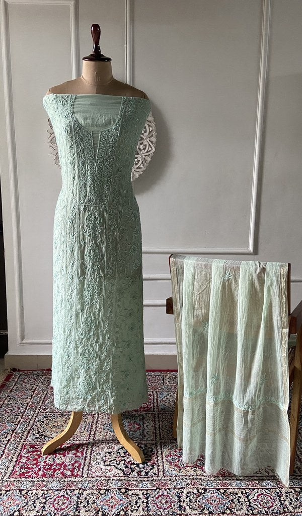 mint green pure mul chanderi chikankari 3 pc unstitched suit set on mannequin