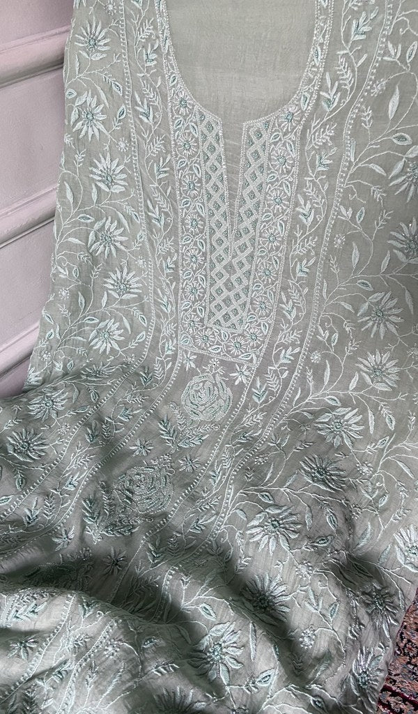 close view of the hand embroidery, mint green pure mul chanderi