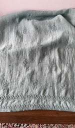 Hem and border of the blue dupatta