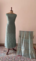 Blue pure mul chanderi chikankari suit set on the mannequin with its dupatta