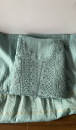 Folded kurta piece and dupatta, chikankari along the hem