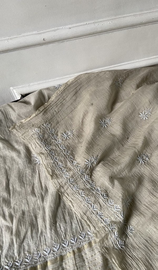 border and hem work on ivory pure mul chanderi