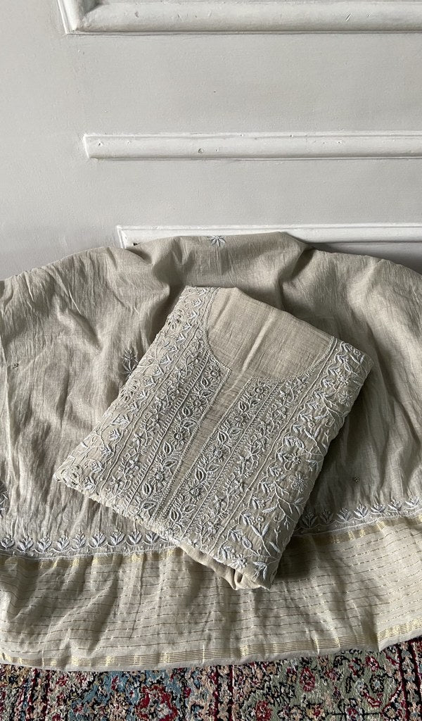 ivory pure mul chanderi chikankari 3 pc unstitched suit set, folded